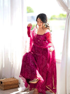 Rani Pink Bandhani Anarkali - sitting pose